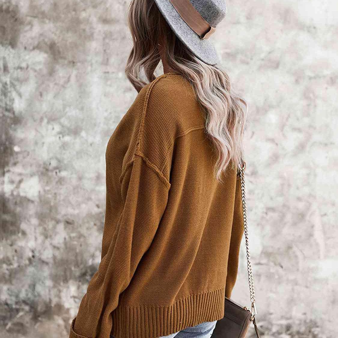 Buttoned Exposed Seam Knit Top